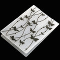 Plastic folding cake decorating mould showing windmill and five-pointed star design options