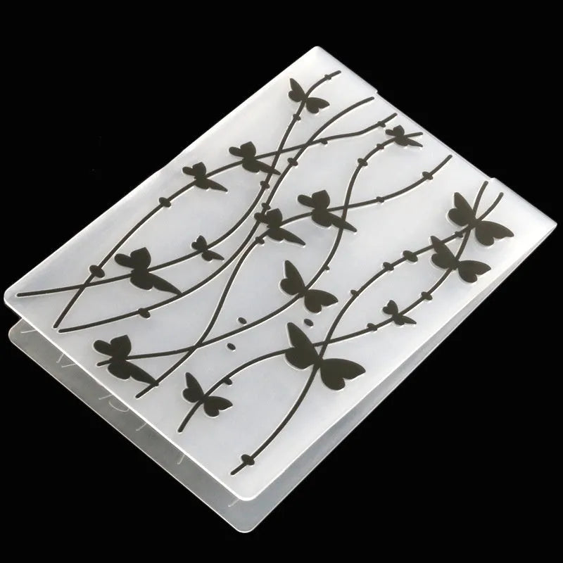 Plastic folding cake decorating mould showing windmill and five-pointed star design options
