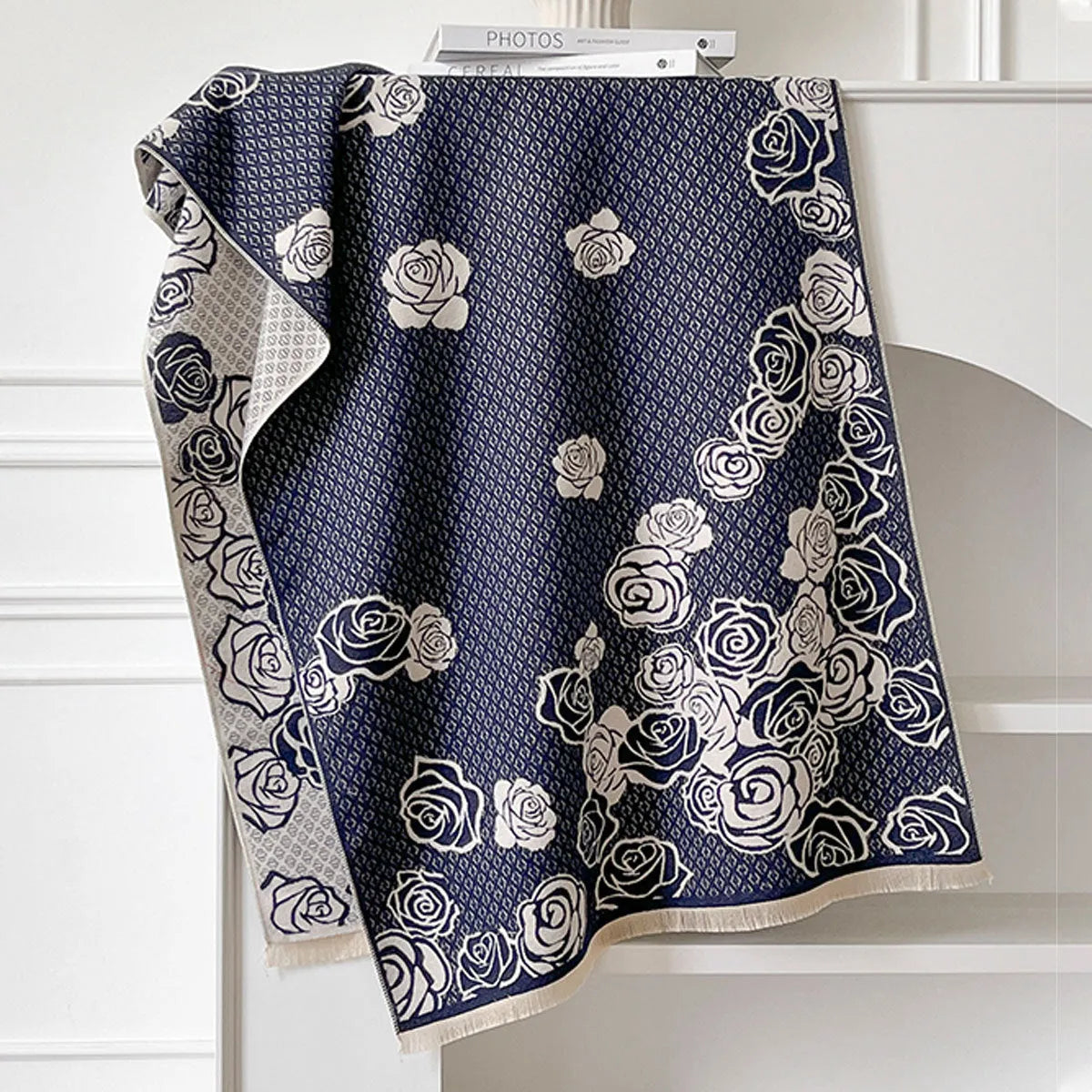 Long grey cashmere-like winter scarf with tassels, shown draped to display its length and texture.