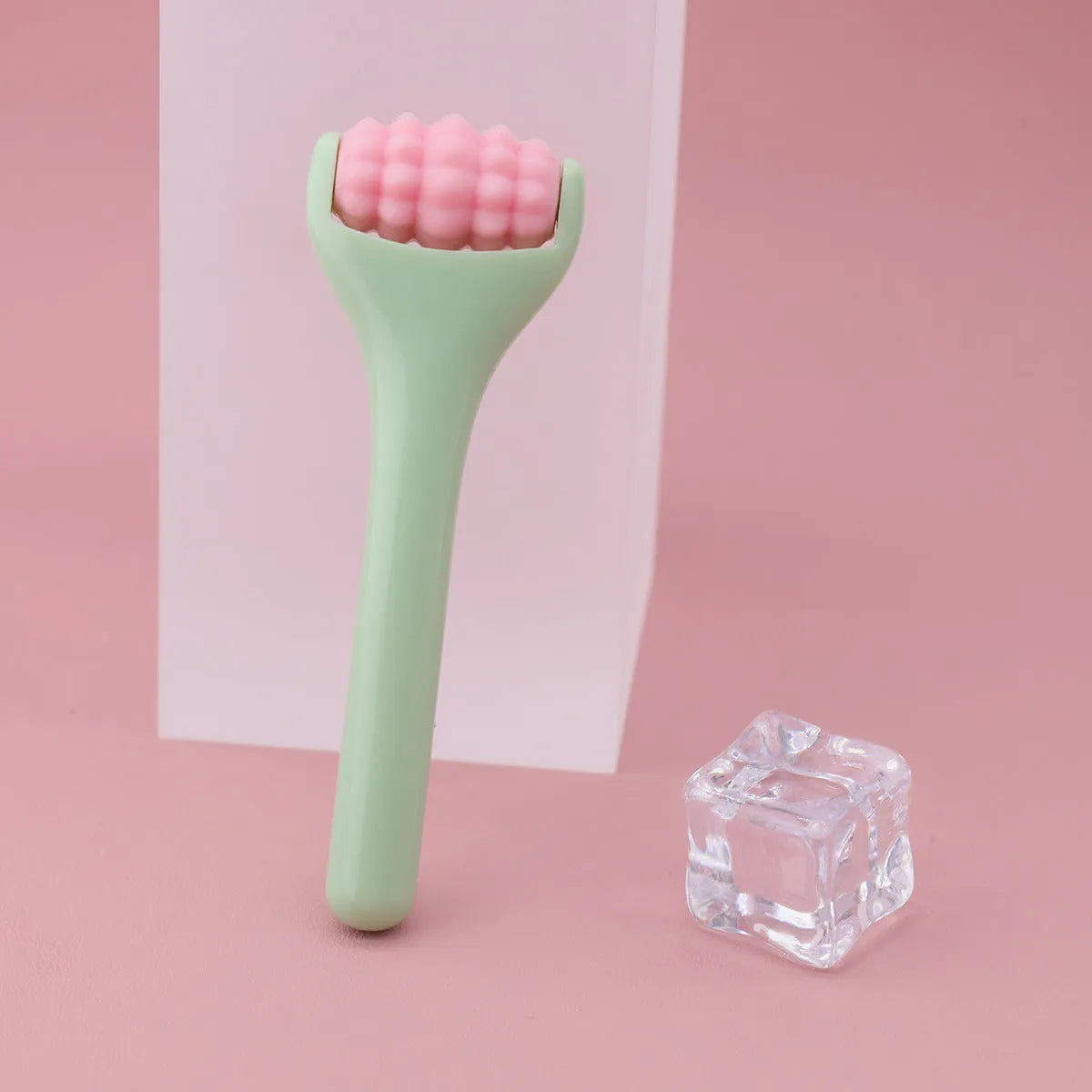 Ice roller eye cream stick 8cm cold compress tool with stainless steel head in pink colour