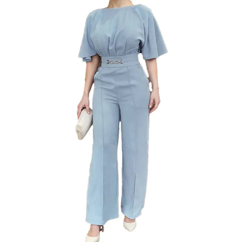 Blue two-piece polyester men's suit with long-sleeve jacket and trousers on a hanger.