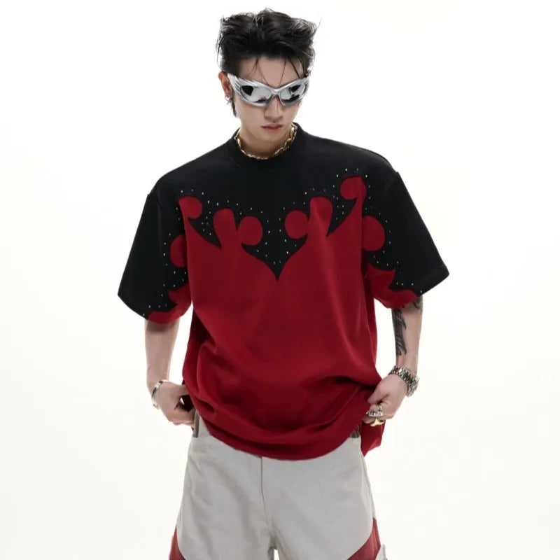 Men's grey loose fit cotton t-shirt with burnt flower stitching and rhinestone detail on the chest.