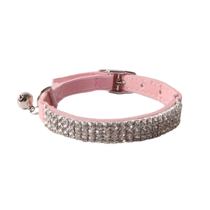 A soft flocking fabric cat collar with a gang drill pattern and an elastic buckle, shown in one of six available colours.