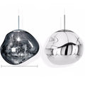 Nordic post-modern chandelier with irregular lava lamp glass design in gold finish.