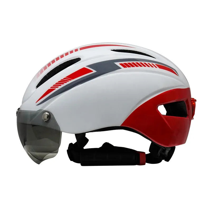 Adult bicycle helmet with integrated rear red taillight shown in a black and blue colour variant.