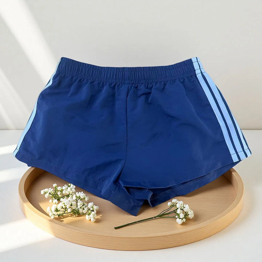Navy blue men's nylon sport shorts with high-waist elastic waistband