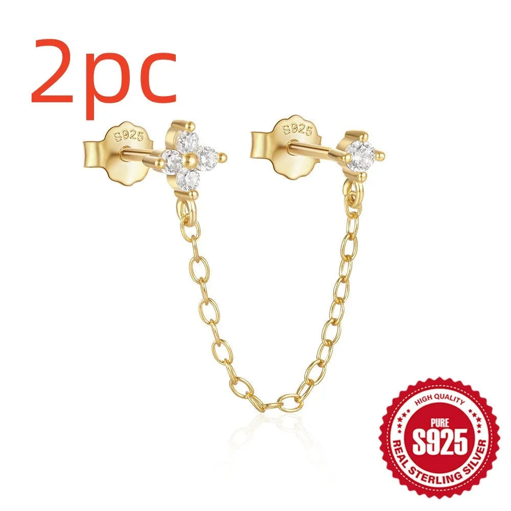 S925 sterling silver geometric ear clip studs with flower and chain design in golden electroplate.