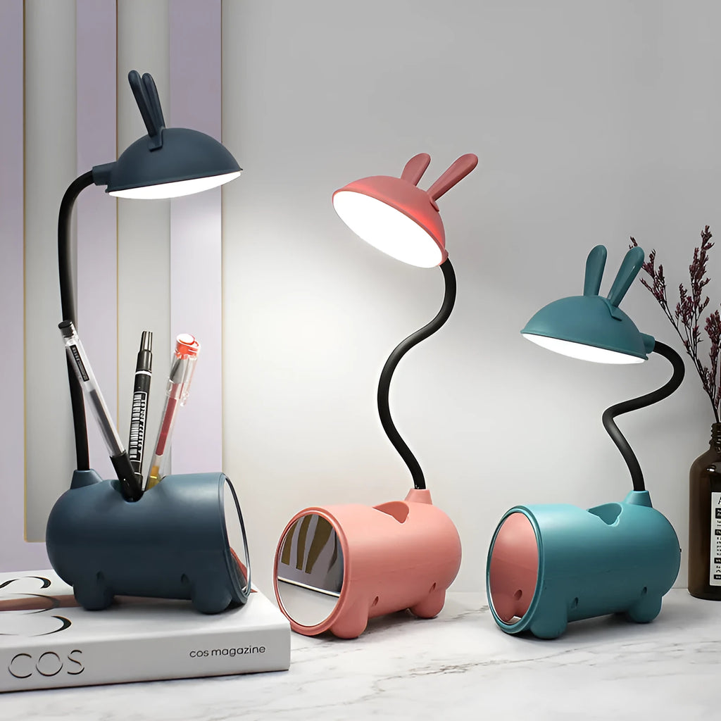 Cartoon-style USB desk lamp with integrated pen container in green colour