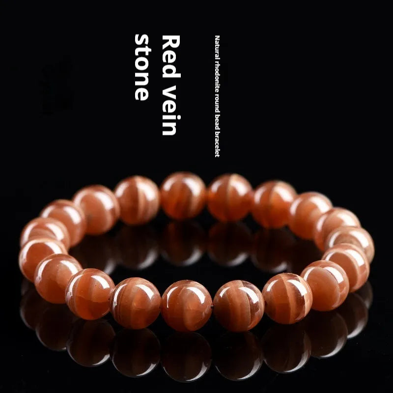 Natural old mine rhodochrosite round beads bracelet with Ruyi elements and geometric design