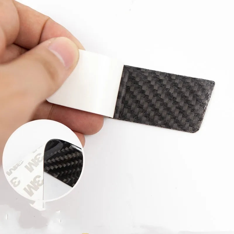 Set of four carbon fibre door handle protection stickers for Tesla Model S.
