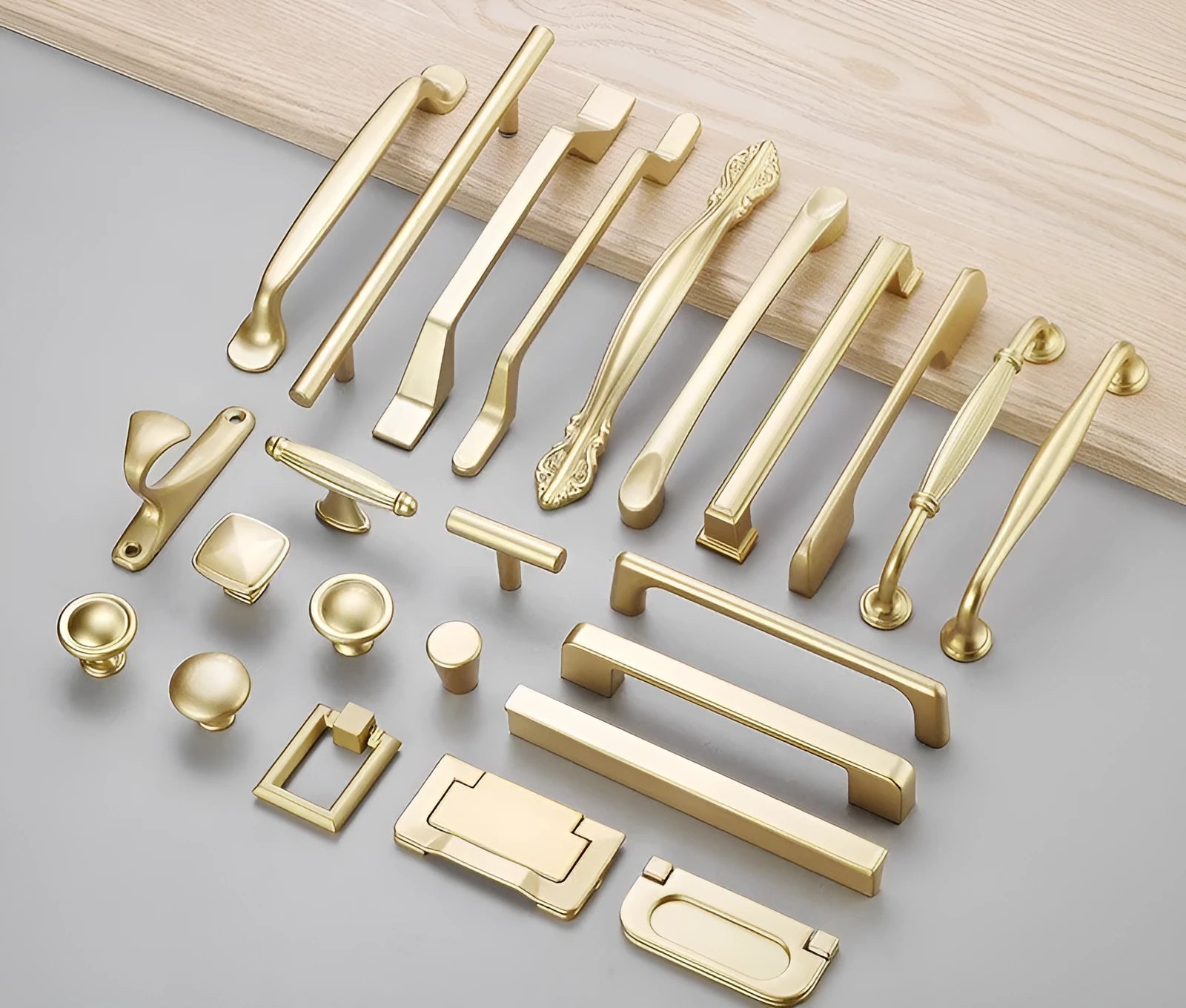 Modern gold T-shaped single hole cabinet handle made from aluminium alloy, showing its profile.