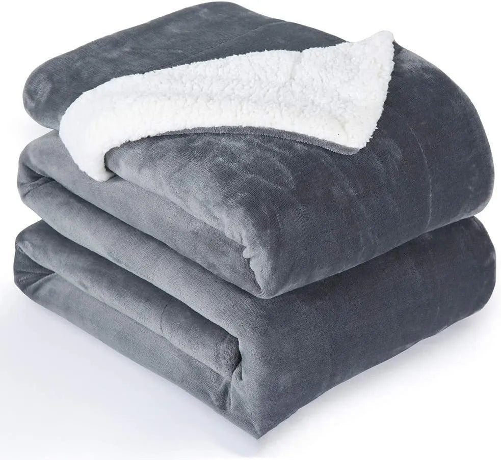 Grey and white USB electric heating blanket with intelligent temperature controls, laid flat.
