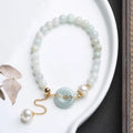 Natural emerald green jade peace buckle pearl bracelet with geometric pendant for women