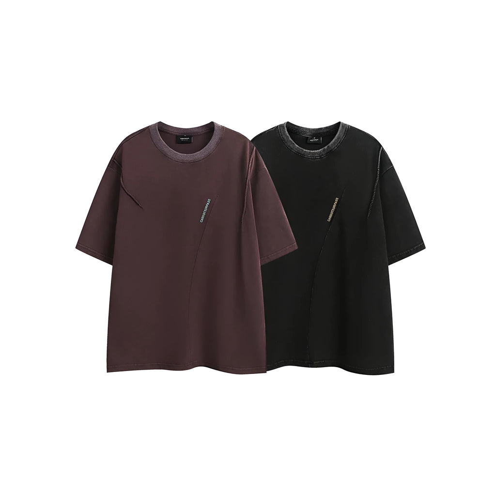 Man's loose fit black retro washed cotton short-sleeved t-shirt on a hanger.