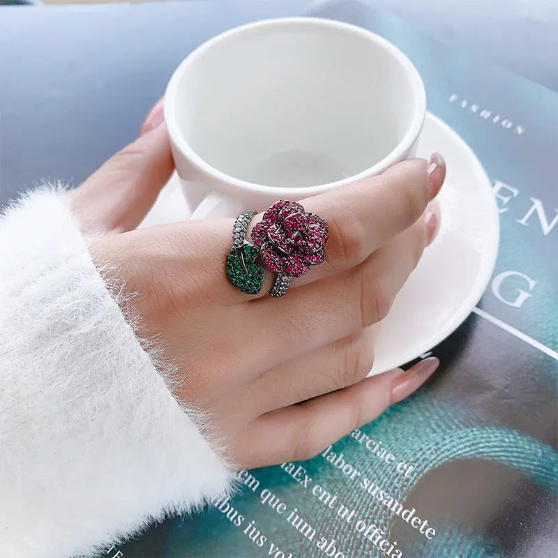 Gold-plated geometric black gold flower ring with simulated red corundum stone for women