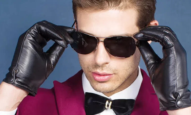 Black touch leather motorcycle driving gloves on a surface, size S to XXL available, unlined single-layer design
