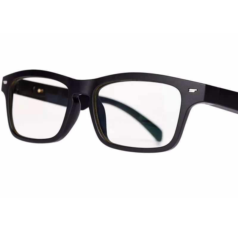 Smart sunglasses with open-ear Bluetooth speakers and polarised lenses on a table with charging case.