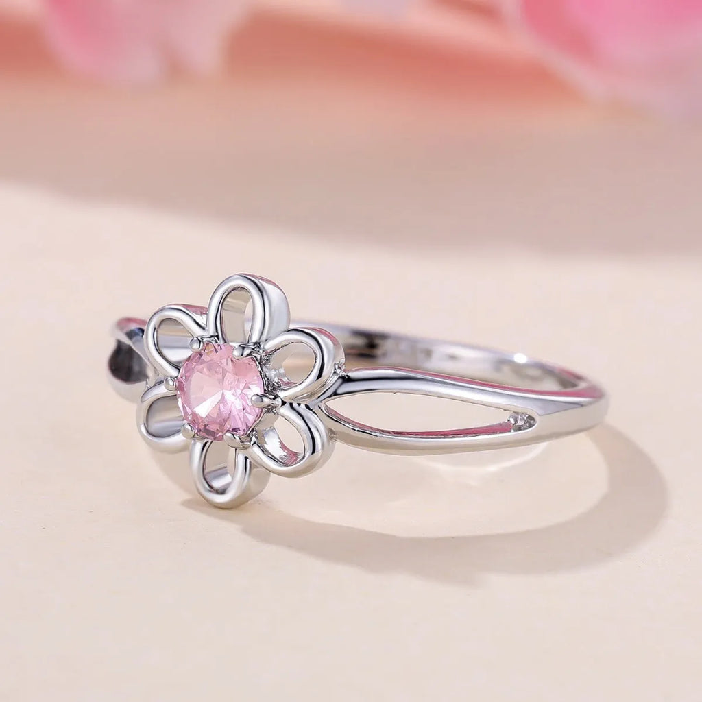 Women's hollow flower fashion ring in electroplated copper with floral design