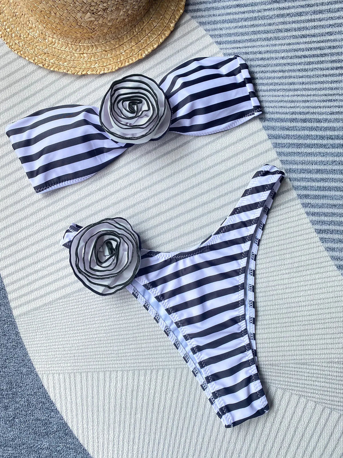 Women's bikini swimsuit with tube top and floral split detail in striped, black or white colours