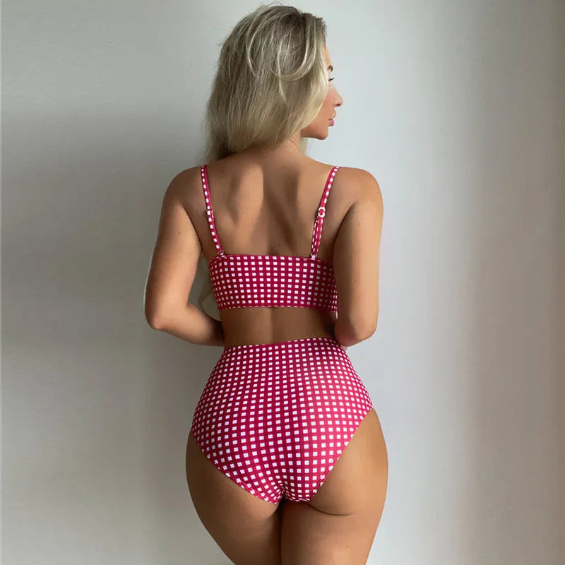 Women's rose red high-waist plaid bikini swimsuit with split sides on mannequin.