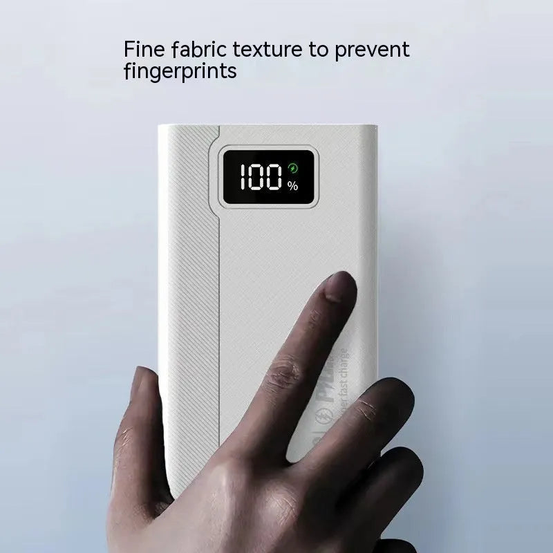 Large capacity power bank in black or white with plastic shell, dimensions 150×76×30-50mm