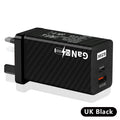 65W GaN universal laptop charger with UK, US, and EU plug heads in black or white