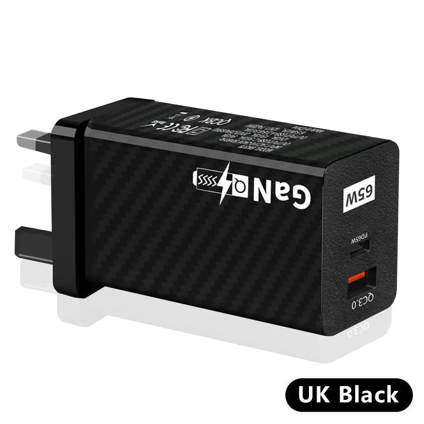 65W GaN universal laptop charger with UK, US, and EU plug heads in black or white