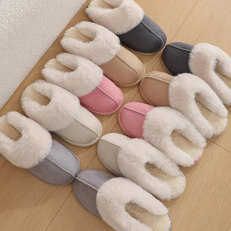 Women's plush winter slippers with artificial wool lining and a PVC sole in multiple colours.