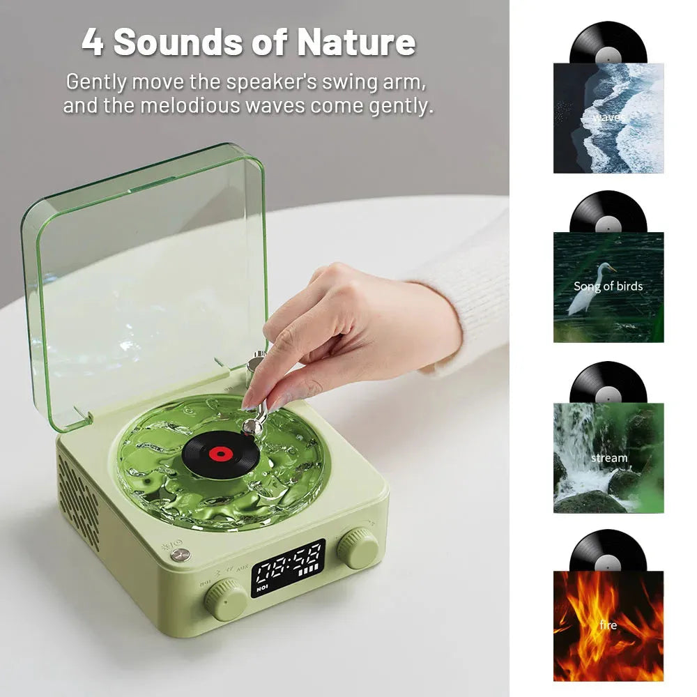Blue retro turntable Bluetooth speaker with rotating disc and RGB light projection