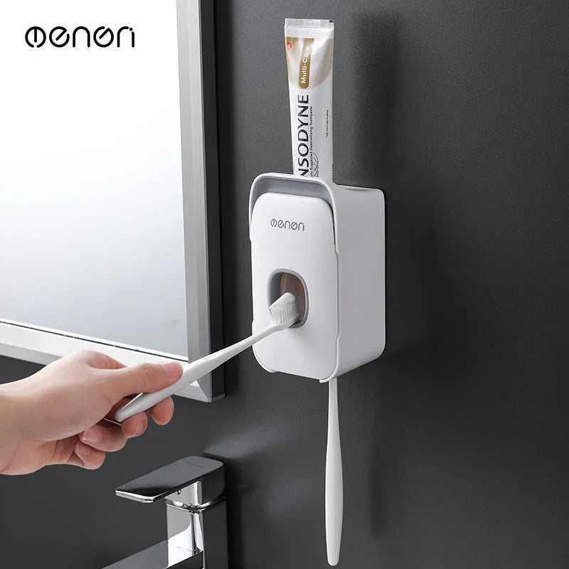 Wall-mounted automatic toothpaste dispenser with touch sensor and LED light in blue colour