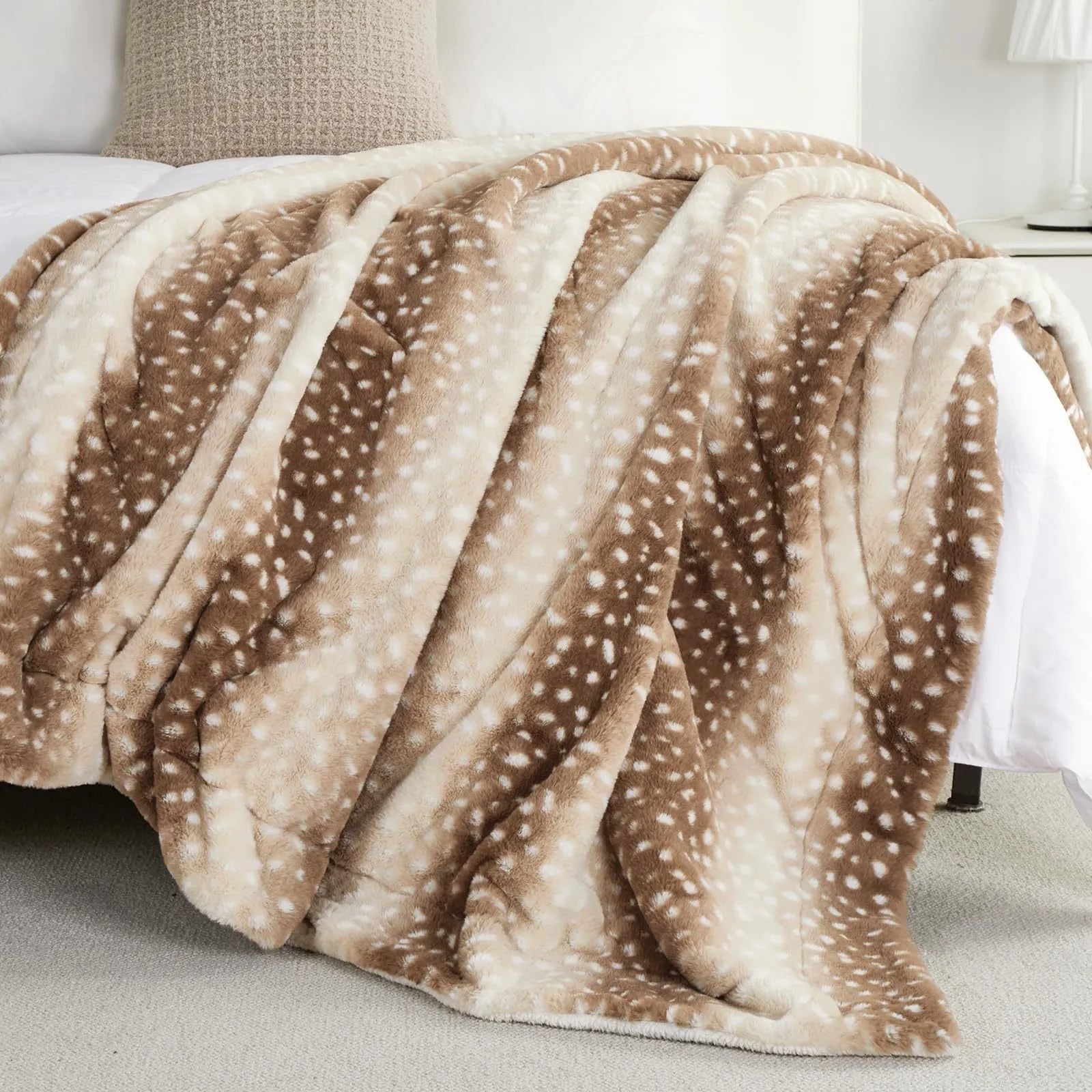 White flannel blanket with animal stripe pattern on a sofa