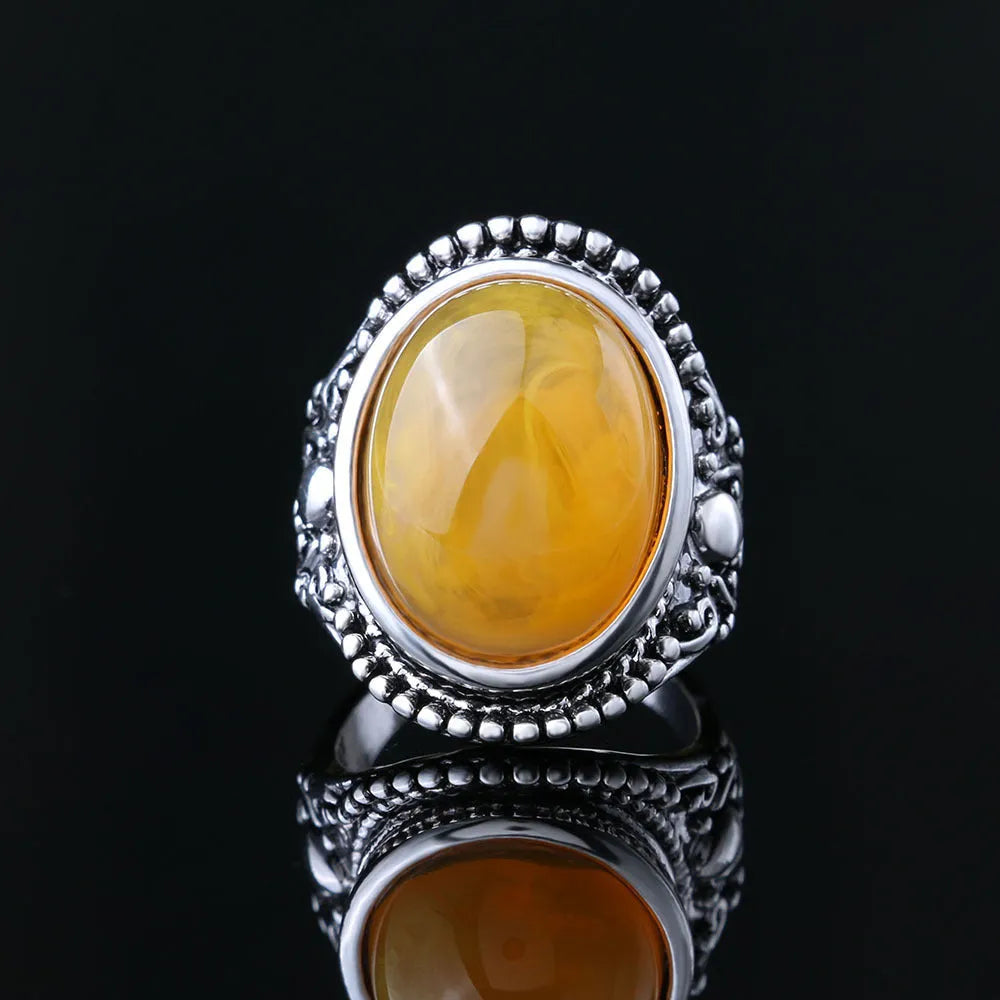 Fluorescent beeswax alloy electroplated ring in antique silver amber colour with a geometric retro design.