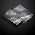 Black and white portable card magnifier with LED light measuring 60 by 40mm for reading small text