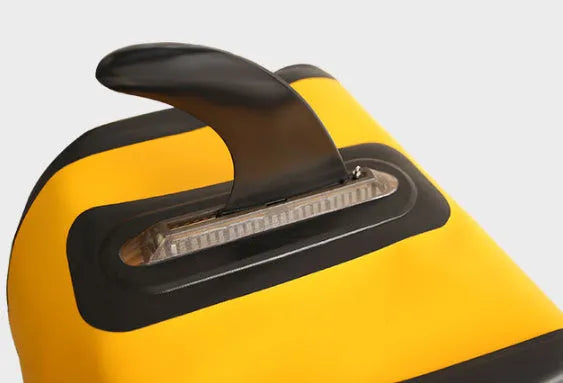 Plastic water dispenser paddle with large removable fish fins attached.