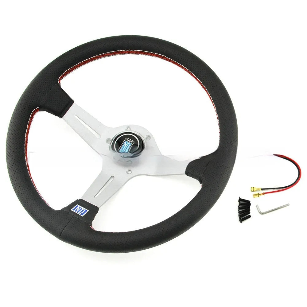 14-inch leather steering wheel with concave centre, shown with black and silver skeleton options
