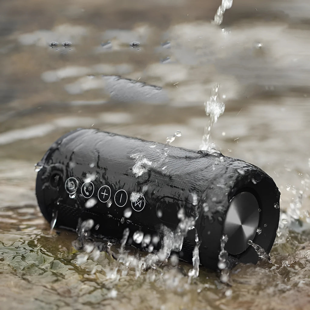 Outdoor waterproof portable Bluetooth speaker in black, camouflage, grey, or red colours.