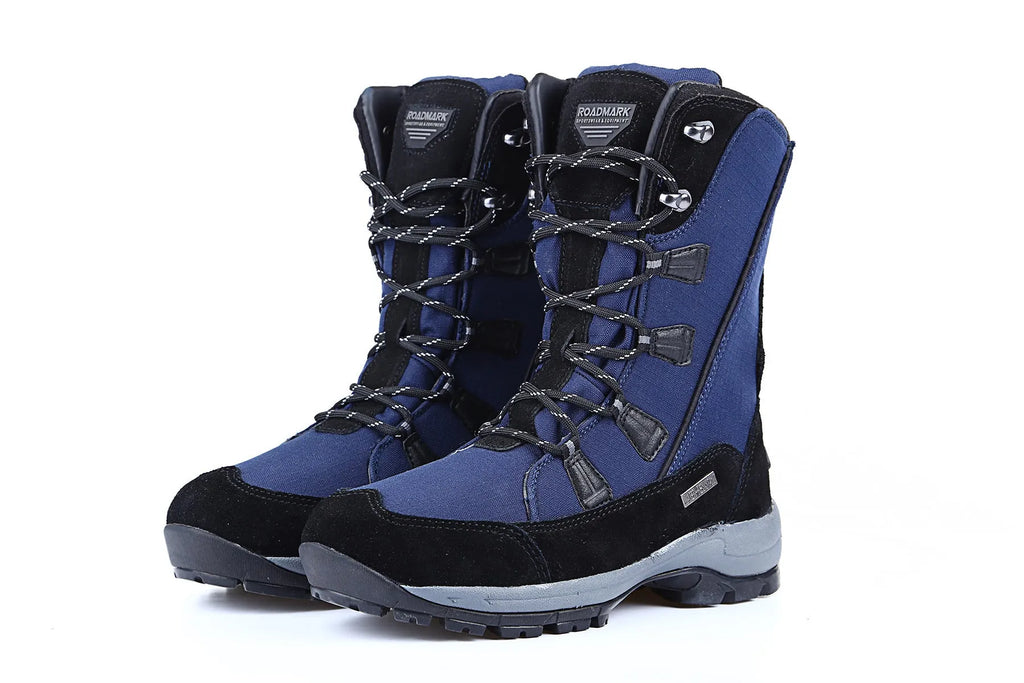 Women's black genuine leather mid-calf snow boots with round toe and thick rubber sole on a white background.