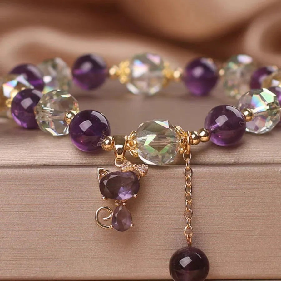 Women's antique style crystal bracelet with purple amethyst fox pendant and five-leaf flower charm.