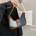 Brown denim women's bucket shoulder bag with diamond mesh panels and chain straps