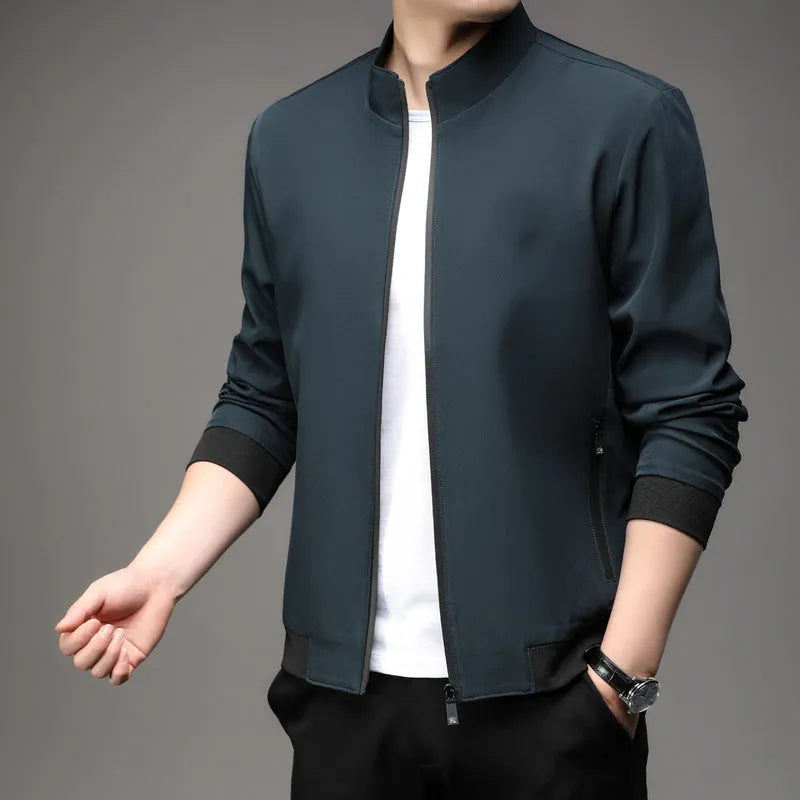 Men's Korean style loose lapel casual jacket in blue with zipper pockets.