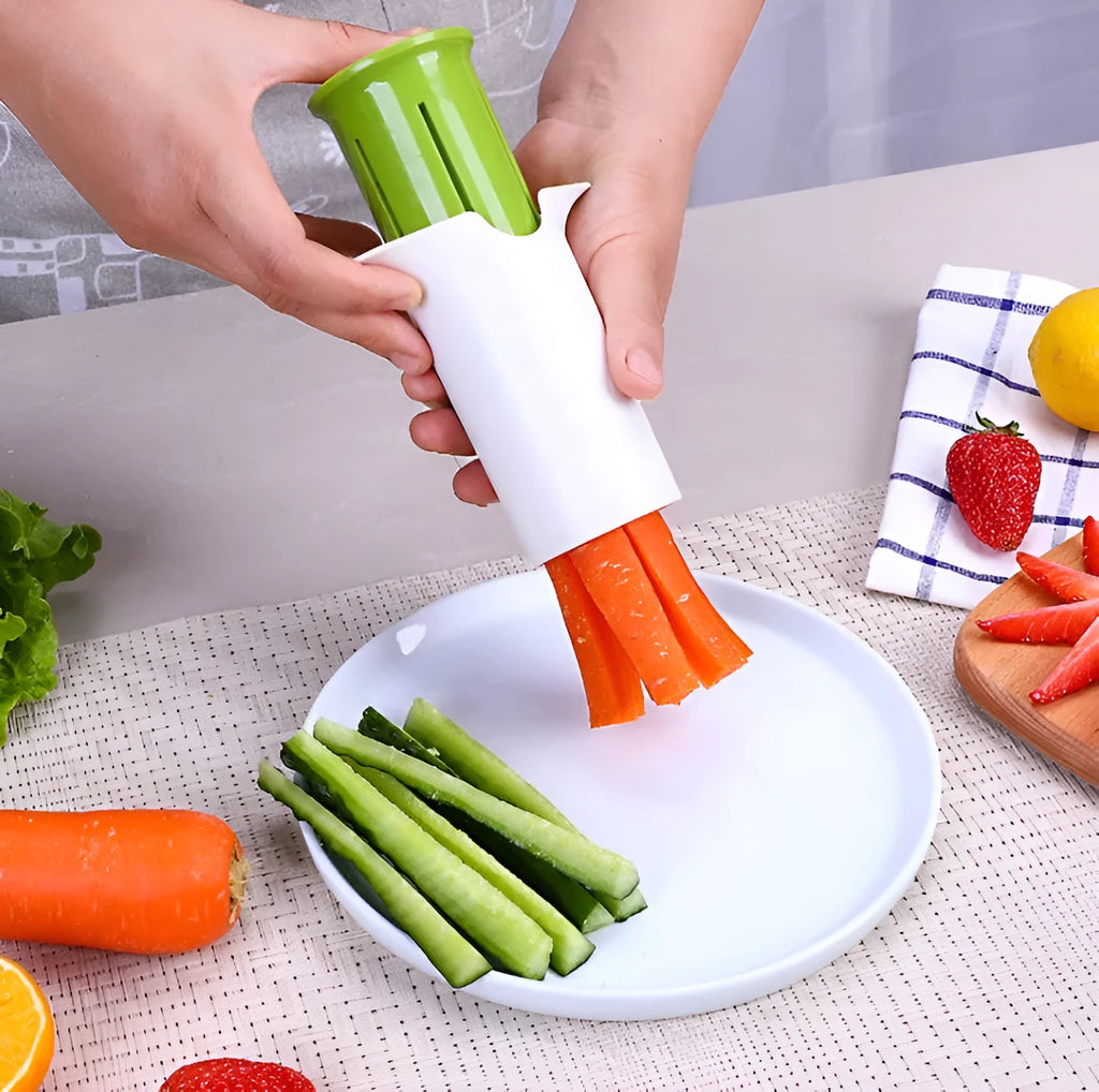 White vegetable cutter with stainless steel blades for slicing cucumbers carrots and strawberries