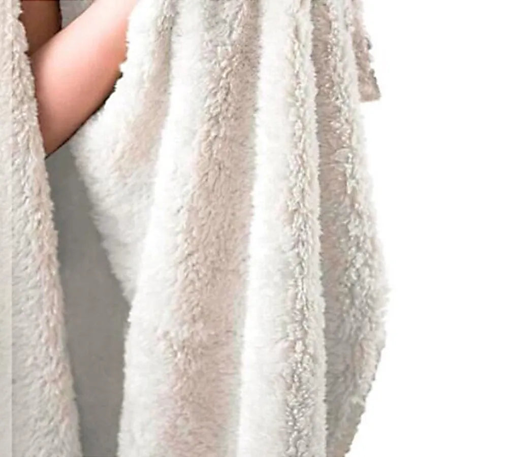 Round coral fleece burrito blanket with food print, shown in a folded pile.