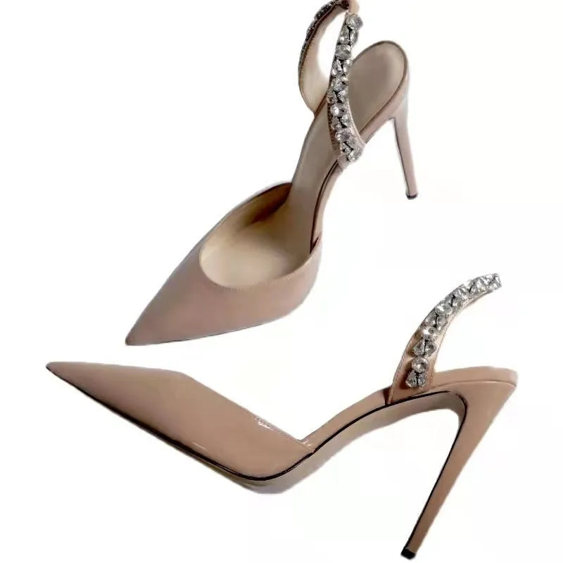 Women's black patent leather pointed-toe high heel sandals with side rhinestone decoration.