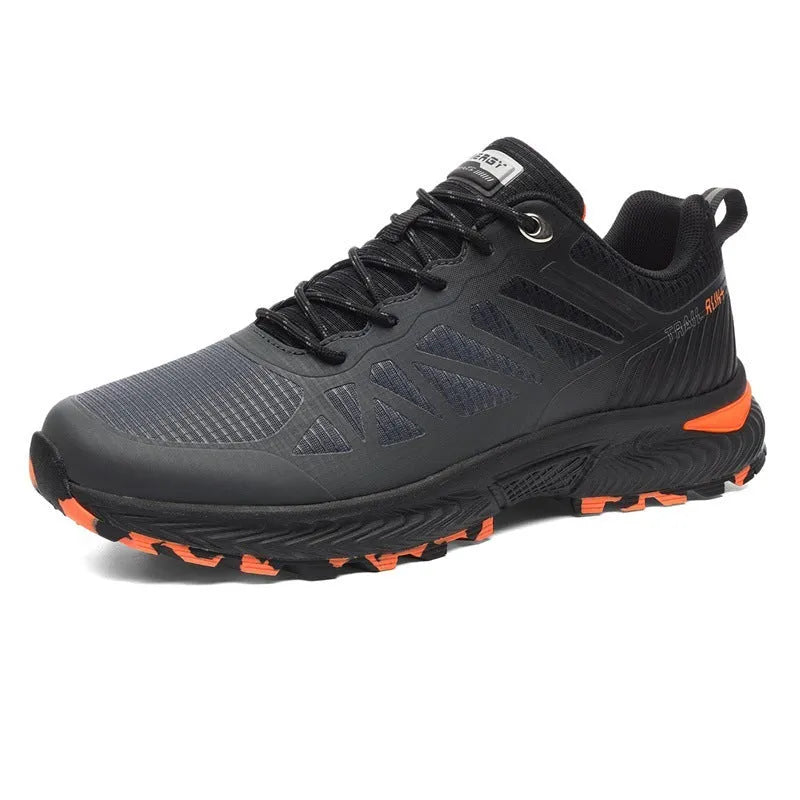 Men's black and orange breathable mesh running shoe with lace-up front on a flat heel.
