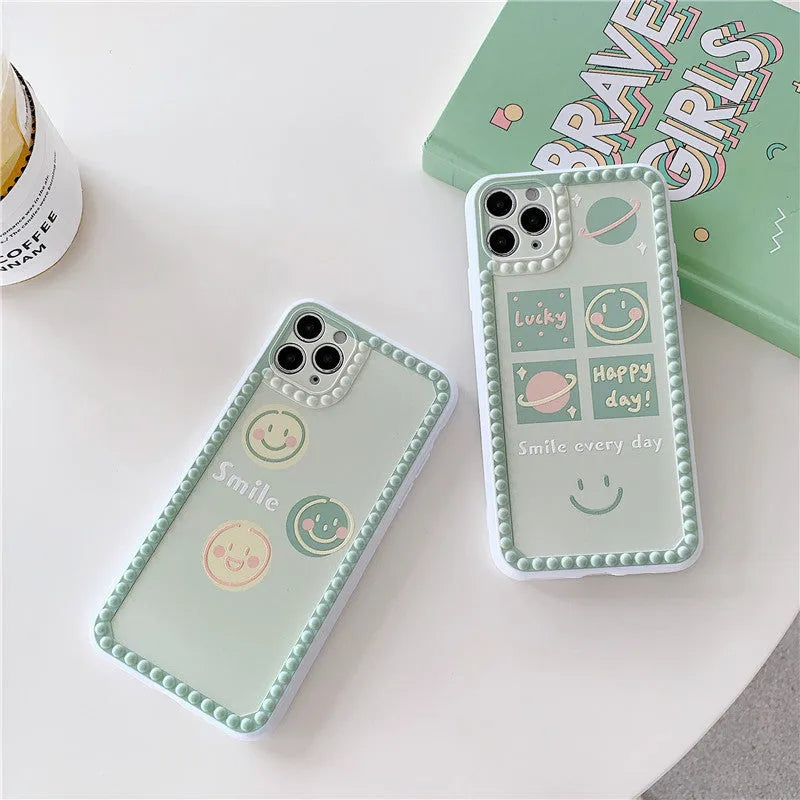 Green iPhone case with geometric smiley face designs and polka dot frames on flexible TPU material