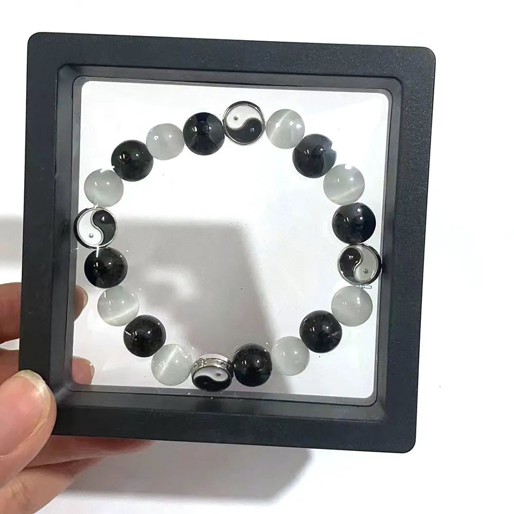 Natural stone Tai Chi bracelet with 10mm polished opal and black agate beads, unisex design