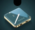 Blue cylindrical aluminium shell mini power bank showing USB ports and compact 83mm size