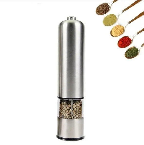 Tall stainless steel electric pepper grinder on a kitchen countertop.