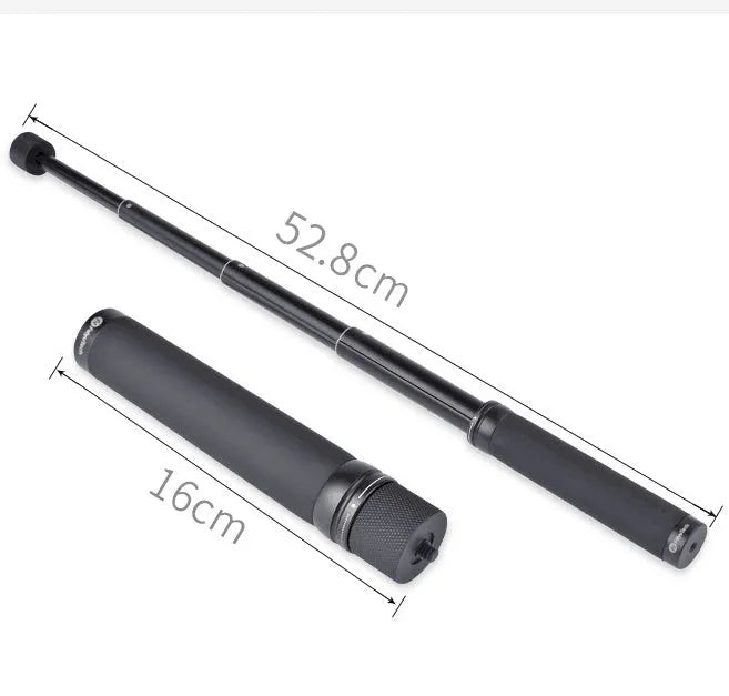 Black retractable aluminium selfie stick extended with a phone attached, showing its handheld stabiliser grip.