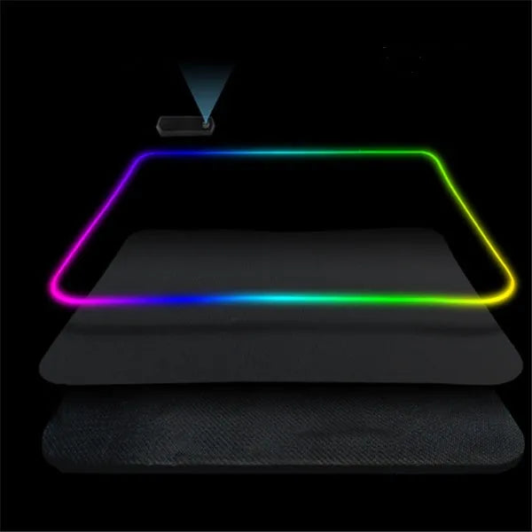 RGB illuminated mouse pad with non-slip rubber base and cloth surface in black